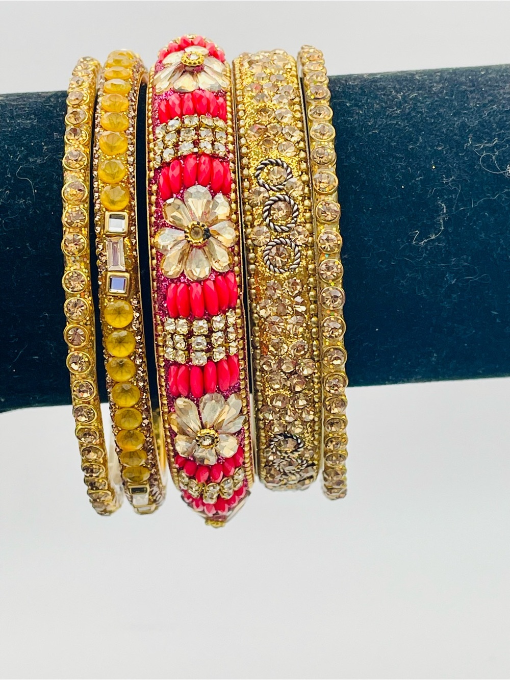 5 Gold-Tone Pink & Yellow Sparkling Crystal Floral Bangle Set. 7 1/2 to 8 inches